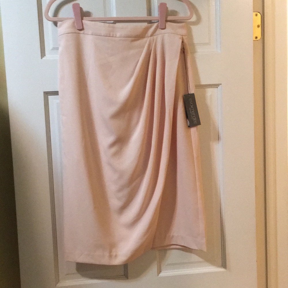 Blush pink skirt.